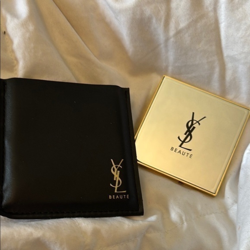 YVES SAINT LAURENT
Novelty Hand Mirror and black  Leather
Sleeve holder